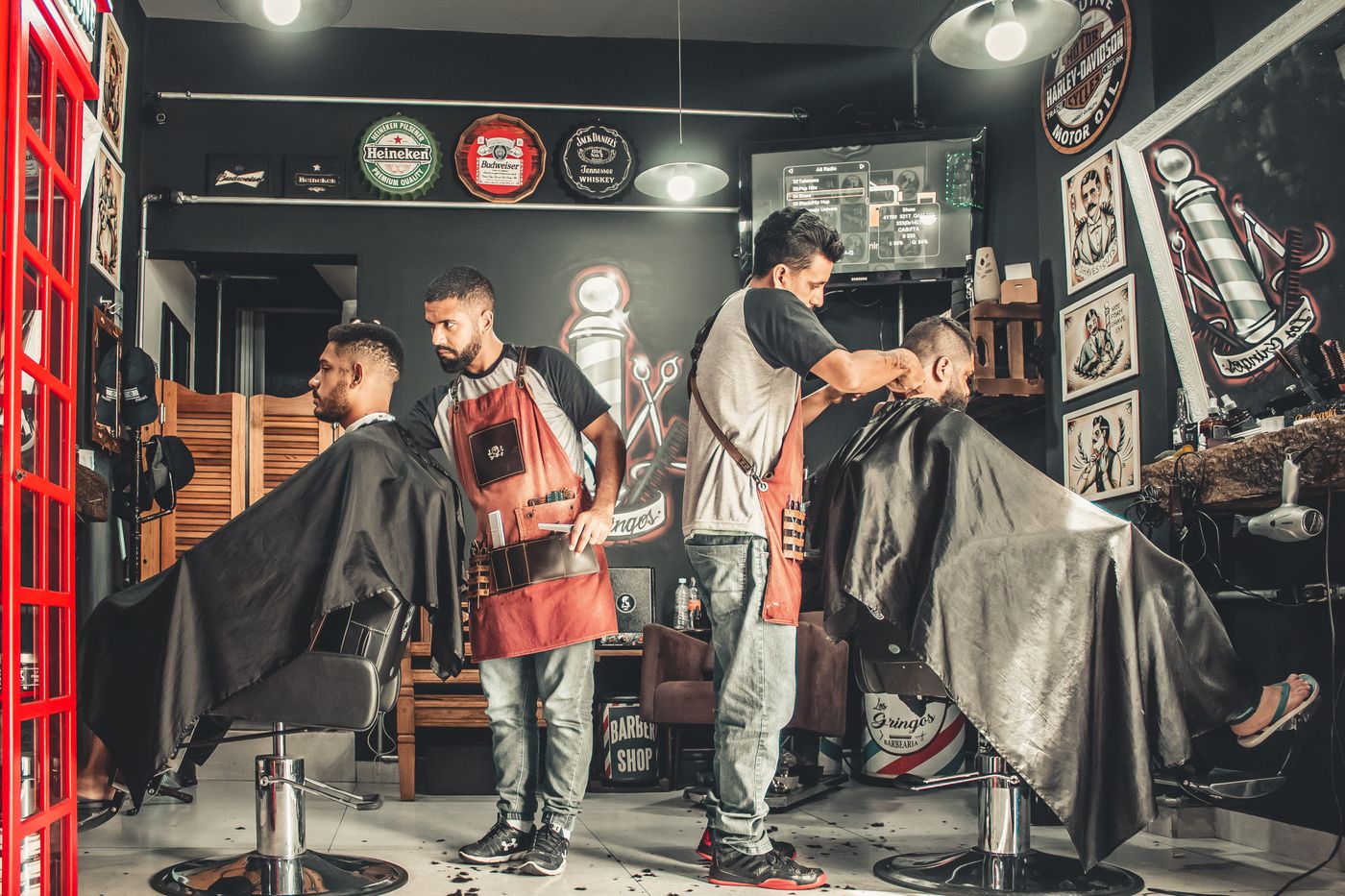 Barbers at work in the men's lounge